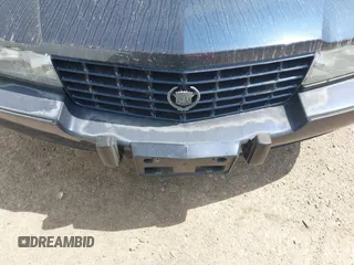 1993 Cadillac Seville Touring STS z VIN 1G6KY5297PU804313, wystawiony jako IAAI lot #42001104 z przebiegiem 242 756 mil mil oraz . Historia ofert i sprzedaży dostępna na DreamBid. Obrazek 6.