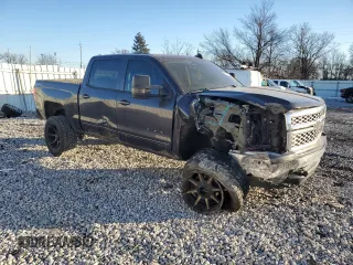 2015 Chevrolet Silverado 1500 LT with VIN 3GCUKREC2FG107879, listed as a Copart auction lot 41915375 with 123,952 mi miles and Salvage Title. Bid and sale history available at DreamBid. Image 4.