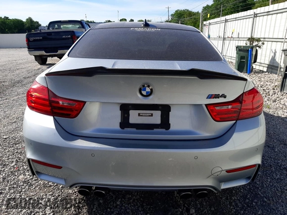 2015 BMW M4 with VIN WBS3R9C58FK334216, listed as a Copart auction lot 61497804 with 112,191 mi miles and Salvage Title. Bid and sale history available at carsss.com. Image 6.