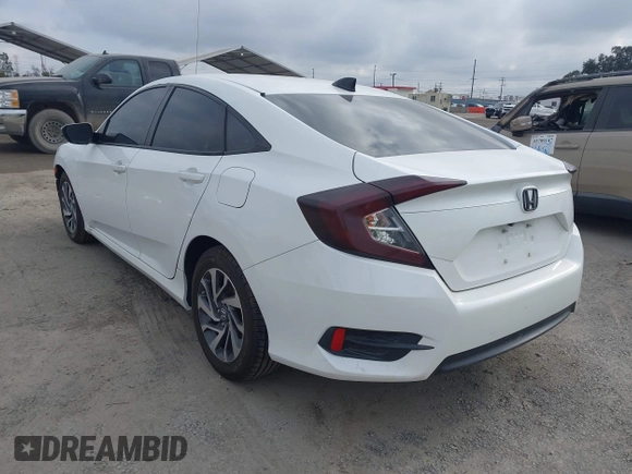 2018 Honda Civic EX with VIN 2HGFC2F74JH566761, listed as a IAAI auction lot 42117730 with 73,946 mi miles and . Bid and sale history available at DreamBid. Image 3.