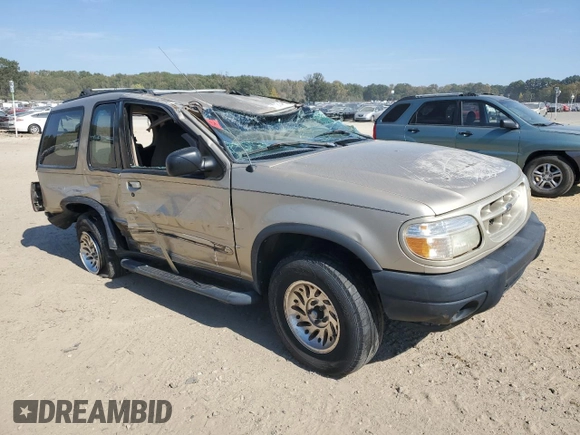 2000 Ford Explorer Sport with VIN 1FMYU60E3YUA95157, listed as a Copart auction lot 77214804 with 322,604 mi miles and Salvage title. Bid and sale history available at DreamBid. Image 4.