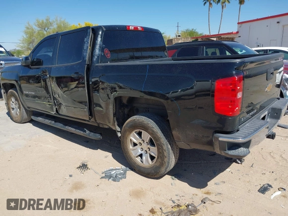 2018 Chevrolet Silverado 1500 LT with VIN 3GCPCREC9JG569925, listed as a IAAI auction lot 42086625 with 184,594 mi miles and . Bid and sale history available at DreamBid. Image 3.