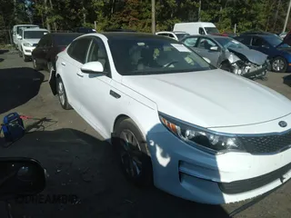 2017 Kia Optima EX with VIN 5XXGU4L32HG156941, listed as a IAAI auction lot 40299001 with 128,592 mi miles. Bid and sale history available at carsss.com. Image 1.