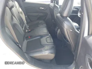 2019 Jeep Cherokee Trailhawk Elite with VIN 1C4PJMBN3KD487461, listed as a IAAI auction lot 41869751 with 91,197 mi miles and . Bid and sale history available at DreamBid. Image 8.