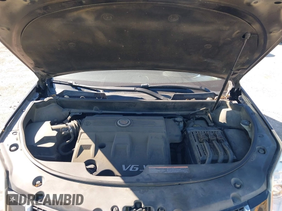 2015 Cadillac SRX with VIN 3GYFNAE30FS573125, listed as a IAAI auction lot 40972187 with 122,612 mi miles and . Bid and sale history available at DreamBid. Image 10.