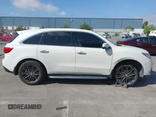 2016 Acura MDX w/Tech with VIN 5FRYD4H47GB045999, listed as a IAAI auction lot 42041010 with 124,096 mi miles. Bid and sale history available at carsss.com. Image 13.