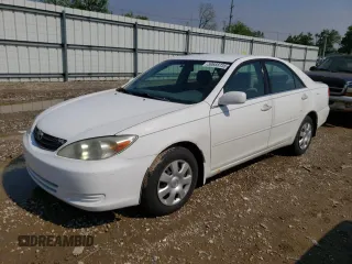 2002 Toyota Camry LE z VIN 4T1BE32K62U023994, wystawiony jako Copart lot #59688735 z przebiegiem 258 440 mil mil oraz Czysty tytuł • Clean title. Historia ofert i sprzedaży dostępna na DreamBid. Obrazek 1.