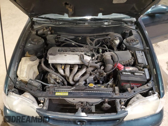 1999 Toyota Corolla VE with VIN 2T1BR12E2XC136739, listed as a Copart auction lot 60693625 with 170,989 mi miles and Salvage title. Bid and sale history available at DreamBid. Image 11.
