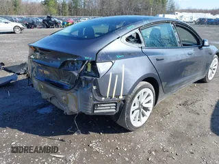 2022 Tesla Model 3 Long Range with VIN 5YJ3E1EB0NF365284, listed as a IAAI auction lot 41899706 with 36,463 mi miles and . Bid and sale history available at DreamBid. Image 4.