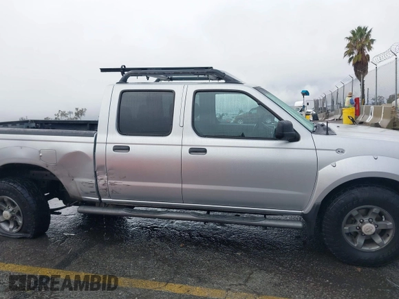 2004 Nissan Frontier XE z VIN 1N6ED29X04C423328, wystawiony jako IAAI lot #41514717 z przebiegiem 297 128 mil mil oraz . Historia ofert i sprzedaży dostępna na DreamBid. Obrazek 14.