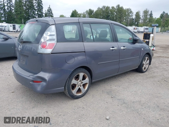 2007 Mazda 5 Touring with VIN JM1CR293570137215, listed as a IAAI auction lot 42497432 with 135,025 mi miles and . Bid and sale history available at DreamBid. Image 4.