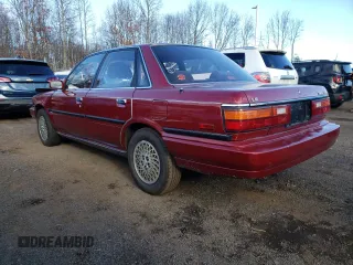 1989 Toyota Camry LE ECT z VIN JT2SV22E5K0253163, wystawiony jako Copart lot #82913404 z przebiegiem 74 454 mil mil oraz Szkoda całkowita • Salvage title. Historia ofert i sprzedaży dostępna na DreamBid. Obrazek 2.