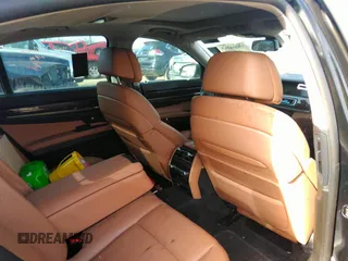 2011 BMW 7 Series 740i with VIN WBAKA4C55BC612634, listed as a IAAI auction lot 35404385 with 156,003 mi miles. Bid and sale history available at carsss.com. Image 8.
