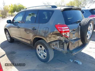 2009 Toyota RAV4 with VIN JTMZF33V69D009256, listed as a IAAI auction lot 41989009 with 142,456 mi miles. Bid and sale history available at carsss.com. Image 3.