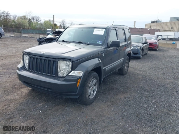 2011 Jeep Liberty Sport with VIN 1J4PN2GK2BW581496, listed as a IAAI auction lot 42080245 with 171,626 mi miles. Bid and sale history available at carsss.com. Image 2.