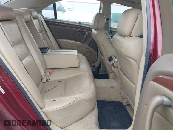 2006 Acura RL z VIN JH4KB16566C005642, wystawiony jako IAAI lot #42613927 z przebiegiem 201 601 mil mil oraz . Historia ofert i sprzedaży dostępna na DreamBid. Obrazek 8.