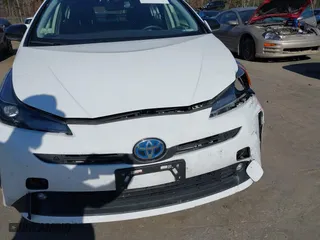 2022 Toyota Prius LE with VIN JTDL9MFU4N3034338, listed as a IAAI auction lot 40760912 with 60,237 mi miles. Bid and sale history available at carsss.com. Image 20.