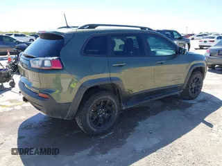 2019 Jeep Cherokee Trailhawk Elite with VIN 1C4PJMBN7KD287506, listed as a IAAI auction lot 42072589 with 108,034 mi miles and . Bid and sale history available at DreamBid. Image 4.