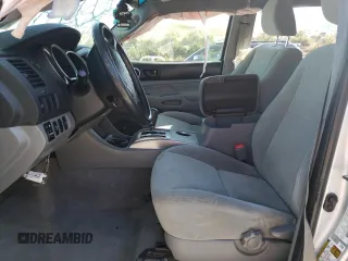 2010 Toyota Tacoma PreRunner with VIN 3TMJU4GN8AM095133, listed as a Copart auction lot 59602955 with 146,136 mi miles and Salvage title. Bid and sale history available at DreamBid. Image 7.
