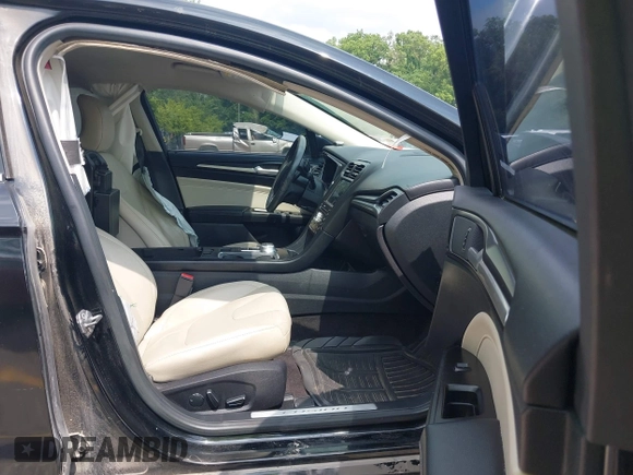 2017 Ford Fusion Titanium with VIN 3FA6P0D92HR252476, listed as a IAAI auction lot 40176942 with 88,818 mi miles and . Bid and sale history available at DreamBid. Image 5.