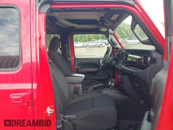 2020 Jeep Wrangler Unlimited Freedom with VIN 1C4HJXDG5LW282721, listed as a IAAI auction lot 42268956 with 47,245 mi miles and . Bid and sale history available at DreamBid. Image 5.