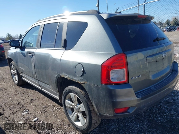 2012 Jeep Compass Latitude with VIN 1C4NJDEBXCD563543, listed as a IAAI auction lot 41711187 with 149,100 mi miles. Bid and sale history available at carsss.com. Image 3.