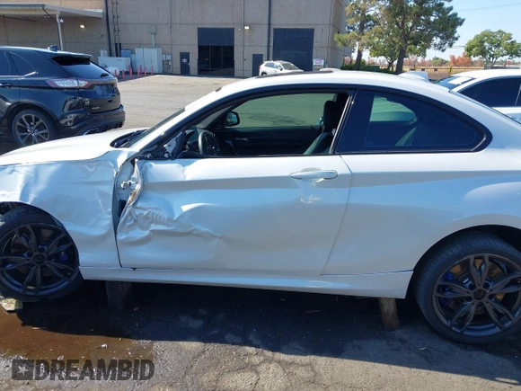 2016 BMW 2 Series M235i with VIN WBA1J7C5XGV359562, listed as a IAAI auction lot 39990299 with 54,022 mi miles. Bid and sale history available at carsss.com. Image 14.