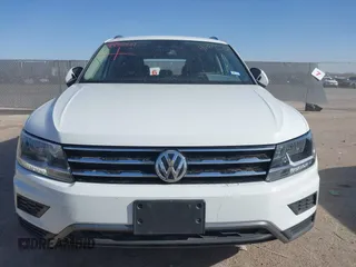 2021 Volkswagen Tiguan SE with VIN 3VV3B7AX9MM051920, listed as a IAAI auction lot 41826721 with 127,699 mi miles and . Bid and sale history available at DreamBid. Image 12.
