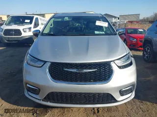 2023 Chrysler Pacifica Hybrid Limited with VIN 2C4RC1S72PR588627, listed as a IAAI auction lot 42063631 with 52,799 mi miles. Bid and sale history available at carsss.com. Image 13.