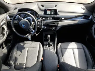 2019 BMW X1 xDrive28i with VIN WBXHT3C59K5L90348, listed as a Copart auction lot 48406515 with 66,292 mi miles and Salvage Title. Bid and sale history available at carsss.com. Image 8.