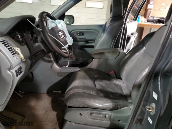 2003 Honda Pilot EX with VIN 2HKYF18723H565883, listed as a Copart auction lot 84520794 with 0 mi miles and Salvage Title. Bid and sale history available at carsss.com. Image 7.