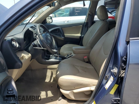 2010 Toyota RAV4 with VIN 2T3ZF4DVXAW034169, listed as a Copart auction lot 63418755 with 127,802 mi miles and Salvage title. Bid and sale history available at DreamBid. Image 7.