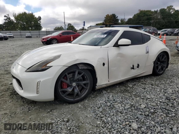 2013 Nissan 370Z with VIN JN1AZ4EH2DM381951, listed as a Copart auction lot 73913174 with 71,583 mi miles and Salvage Title. Bid and sale history available at carsss.com. Image 1.