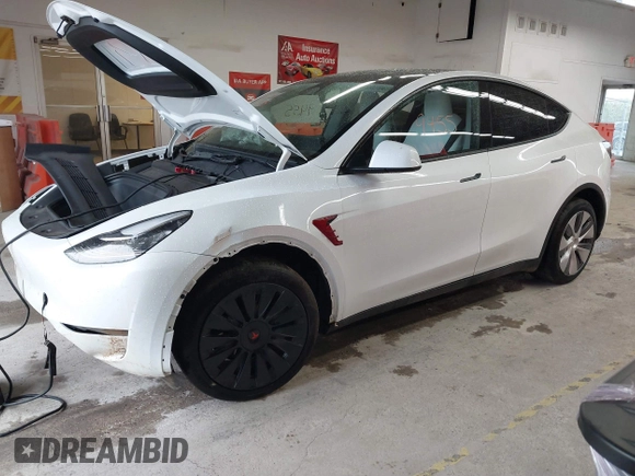 2023 Tesla Model Y Long Range with VIN 7SAYGDEE7PA100523, listed as a IAAI auction lot 40399455 with 18,885 mi miles and . Bid and sale history available at DreamBid. Image 19.
