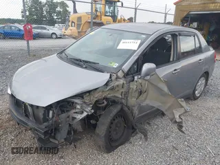 2011 Nissan Versa 1.8 S with VIN 3N1BC1AP3BL359367, listed as a IAAI auction lot 40731117 with 144,660 mi miles. Bid and sale history available at carsss.com. Image 2.