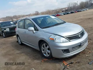 2012 Nissan Versa S with VIN 3N1BC1CP2CK272290, listed as a IAAI auction lot 42030626 with 136,000 mi miles. Bid and sale history available at carsss.com. Image 1.