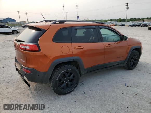 2015 Jeep Cherokee Trailhawk with VIN 1C4PJMBS0FW675807, listed as a Copart auction lot 58800615 with 109,019 mi miles and Salvage title. Bid and sale history available at DreamBid. Image 3.