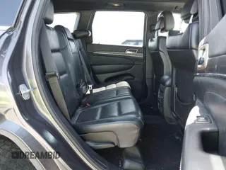 2014 Jeep Grand Cherokee Limited z VIN 1C4RJFBT0EC241030, wystawiony jako IAAI lot #41851316 z przebiegiem 104 344 mil mil oraz . Historia ofert i sprzedaży dostępna na DreamBid. Obrazek 8.