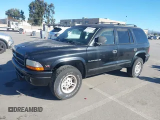1999 Dodge Durango z VIN 1B4HS28Z4XF612380, wystawiony jako IAAI lot #41283684 z przebiegiem 133 226 mil mil oraz . Historia ofert i sprzedaży dostępna na DreamBid. Obrazek 2.