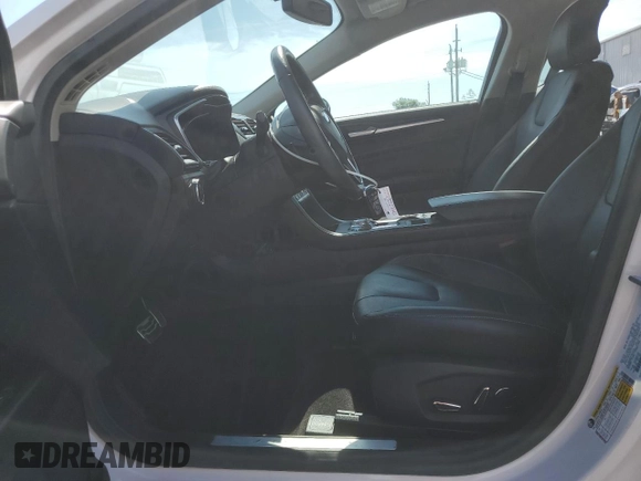 2017 Ford Fusion Titanium с VIN 3FA6P0K96HR161679, выставлен на аукционе Copart как лот 61237935 с пробегом 66 680 миль миль и Списание • Salvage title. История ставок и продаж доступна на DreamBid. Изображение 7.
