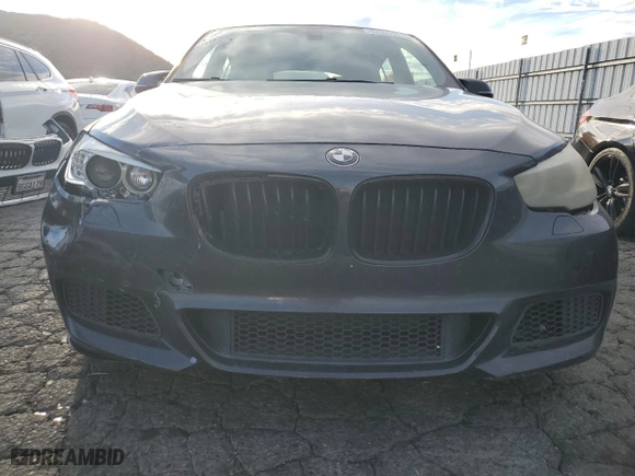 2015 BMW 5 Series Gran Turismo 535i with VIN WBA5M2C58FGH99054, listed as a Copart auction lot 82330974 with 113,343 mi miles and Clean Title. Bid and sale history available at carsss.com. Image 5.