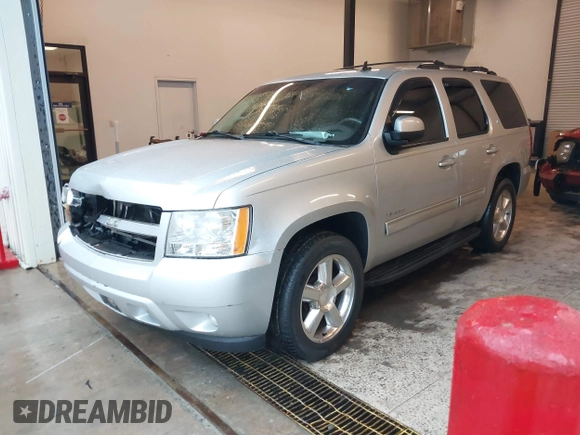 2010 Chevrolet Tahoe LT with VIN 1GNMCBE35AR114622, listed as a IAAI auction lot 41974795 with 248,109 mi miles and . Bid and sale history available at DreamBid. Image 17.