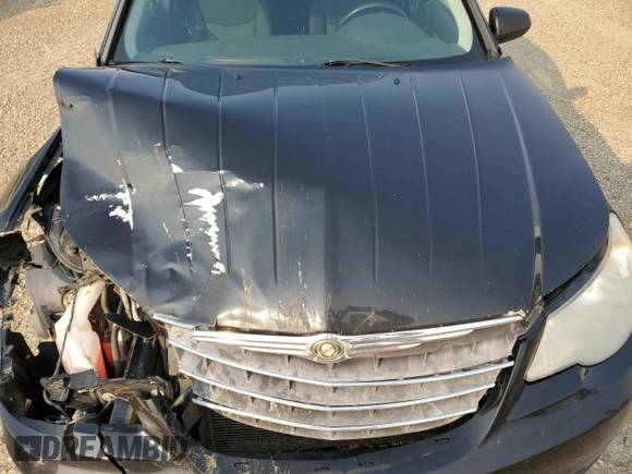 2009 Chrysler Sebring Touring z VIN 1C3LC56D69N531168, wystawiony jako Copart lot #59331415 z przebiegiem 225 463 mil mil oraz Szkoda całkowita • Salvage title. Historia ofert i sprzedaży dostępna na DreamBid. Obrazek 11.