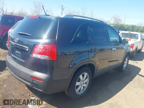 2012 Kia Sorento LX with VIN 5XYKT4A67CG247010, listed as a IAAI auction lot 42028544 with 223,389 mi miles. Bid and sale history available at carsss.com. Image 4.