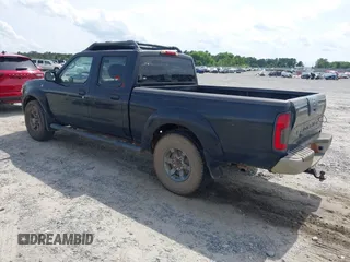 2004 Nissan Frontier XE z VIN 1N6ED29X24C421886, wystawiony jako IAAI lot #42366824 z przebiegiem 184 941 mil mil oraz . Historia ofert i sprzedaży dostępna na DreamBid. Obrazek 3.