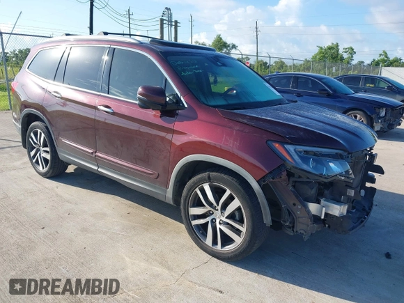 2017 Honda Pilot Touring with VIN 5FNYF5H96HB038413, listed as a IAAI auction lot 42594065 with 130,501 mi miles and . Bid and sale history available at DreamBid. Image 1.