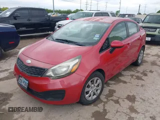 2012 Kia Rio LX with VIN KNADM4A36C6085057, listed as a IAAI auction lot 42111921 with 136,217 mi miles. Bid and sale history available at carsss.com. Image 2.