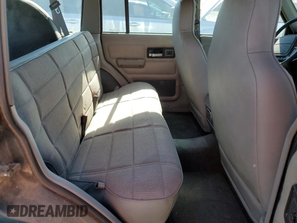 1996 Jeep Cherokee Sport with VIN 1J4FJ68S3TL257912, listed as a Copart auction lot 77109634 with 53,841 mi miles and Clean Title. Bid and sale history available at carsss.com. Image 11.