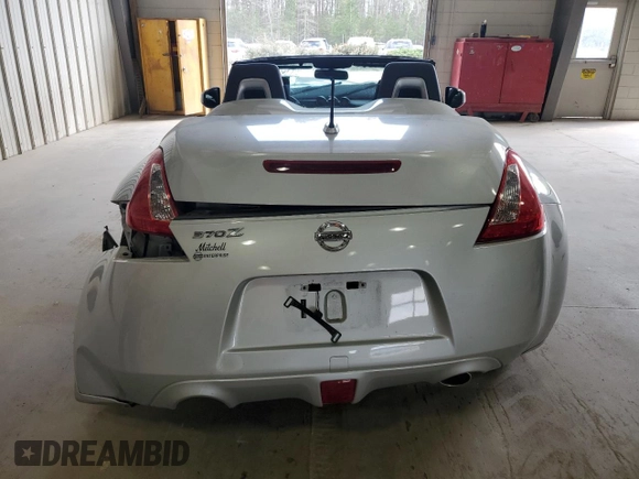 2014 Nissan 370Z Touring with VIN JN1AZ4FH0EM621207, listed as a Copart auction lot 50928485 with Not Provided miles and Salvage Title. Bid and sale history available at DreamBid. Image 6.