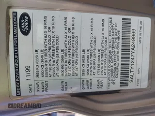 2000 Land Rover Discovery Cloth z VIN SALTY1247YA249969, wystawiony jako IAAI lot #42246445 z przebiegiem 188 643 mil mil oraz . Historia ofert i sprzedaży dostępna na DreamBid. Obrazek 9.